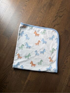 Kissy Kissy White Baby Blanket with Blue, Green & Orange Zebra Print